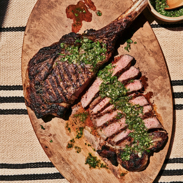 Grilled Ribeye a juicy grilled ribeye finished with fresh chimichurri