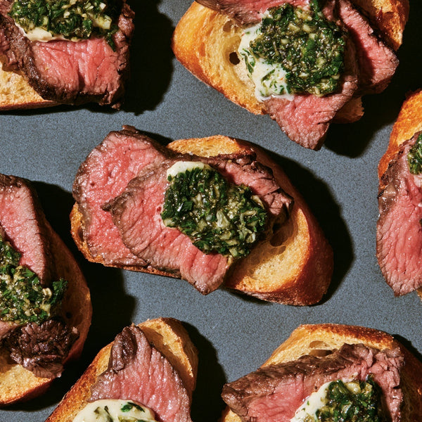 Steak Crostini Crispy toasted baguette topped with juicy, tender steak